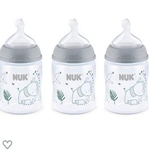 Nuk Bottles (3) plus 3 extra nipples